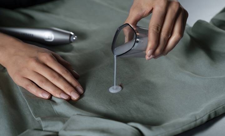 Adicionar a água na zona manchada