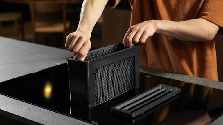 Colocar o filtro do exaustor