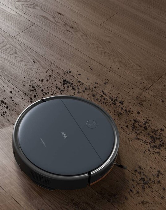 Aspirador robot em funcionamento